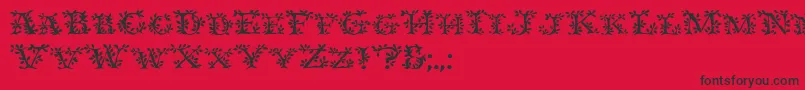 フォントIvydisplaycaps – 赤い背景に黒い文字
