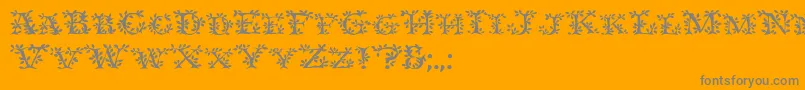 Ivydisplaycaps-Schriftart – Graue Schriften auf orangefarbenem Hintergrund