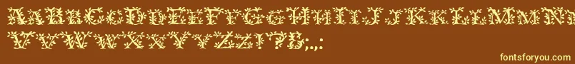 Ivydisplaycaps-fontti – keltaiset fontit ruskealla taustalla