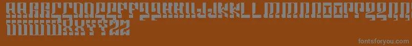 Marshosbn-fontti – harmaat kirjasimet ruskealla taustalla