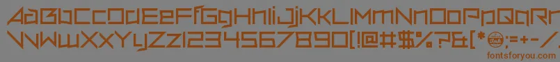 フォントVerminVore – 茶色の文字が灰色の背景にあります。