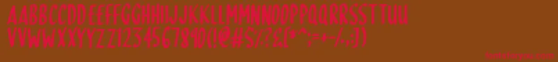 SkinnyDipping Font – Red Fonts on Brown Background