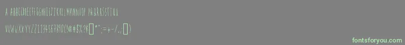 Firefly-Schriftart – Grüne Schriften auf grauem Hintergrund