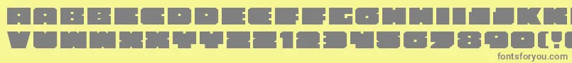 フォントAnakefkaExpanded – 黄色の背景に灰色の文字