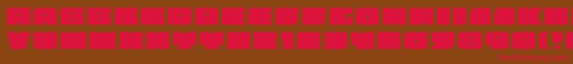 フォントAnakefkaExpanded – 赤い文字が茶色の背景にあります。