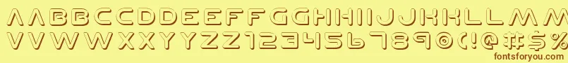 フォントPlanetNShadow – 茶色の文字が黄色の背景にあります。