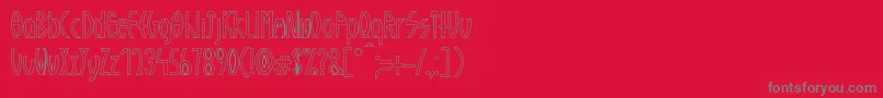 GuazhiruRegularOutlined-Schriftart – Graue Schriften auf rotem Hintergrund