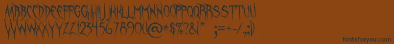 UnquietSpirits Font – Black Fonts on Brown Background