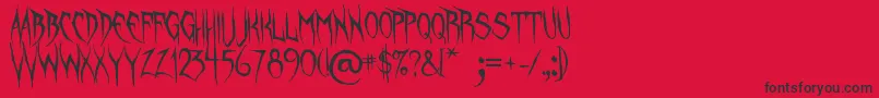 フォントUnquietSpirits – 赤い背景に黒い文字