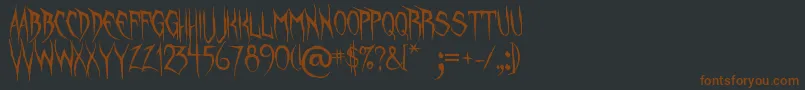 UnquietSpirits Font – Brown Fonts on Black Background
