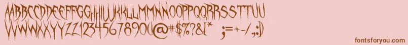 UnquietSpirits Font – Brown Fonts on Pink Background