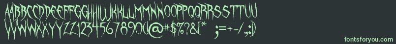 UnquietSpirits Font – Green Fonts on Black Background