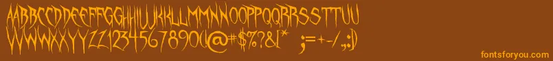 UnquietSpirits Font – Orange Fonts on Brown Background