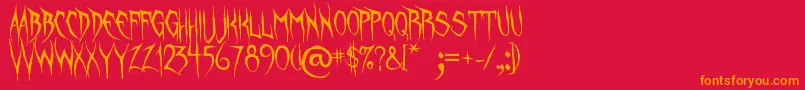 フォントUnquietSpirits – 赤い背景にオレンジの文字