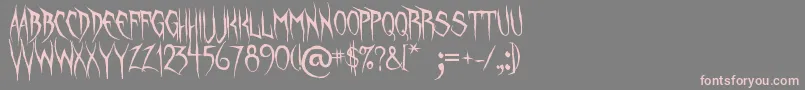 UnquietSpirits-fontti – vaaleanpunaiset fontit harmaalla taustalla