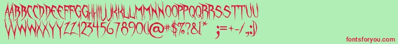 UnquietSpirits Font – Red Fonts on Green Background