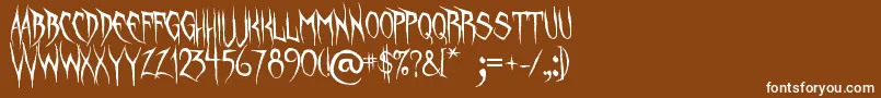 UnquietSpirits Font – White Fonts on Brown Background