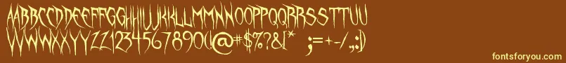 UnquietSpirits Font – Yellow Fonts on Brown Background
