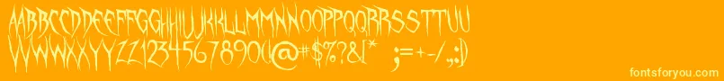 フォントUnquietSpirits – オレンジの背景に黄色の文字