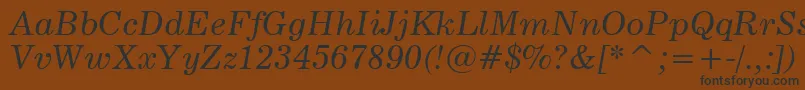 News705ItalicBt Font – Black Fonts on Brown Background