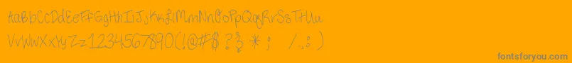 ThirdGradeHandwriting Font – Gray Fonts on Orange Background