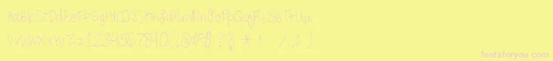 Fonte ThirdGradeHandwriting – fontes rosa em um fundo amarelo