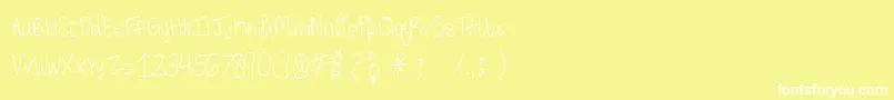 ThirdGradeHandwriting-Schriftart – Weiße Schriften auf gelbem Hintergrund