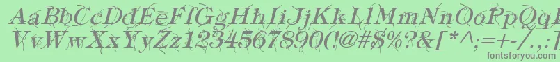 フォントTypographyTiesItalic – 緑の背景に灰色の文字