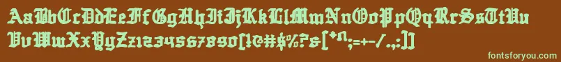 フォントQuestknight – 緑色の文字が茶色の背景にあります。