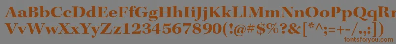 フォントKeplerstdBoldextsubh – 茶色の文字が灰色の背景にあります。