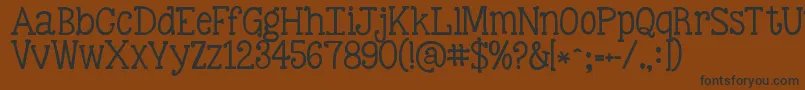 Kgbestillandknow Font – Black Fonts on Brown Background