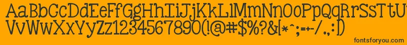 Kgbestillandknow-fontti – mustat fontit oranssilla taustalla
