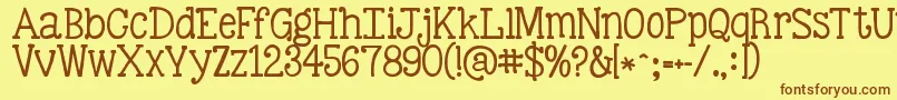 Czcionka Kgbestillandknow – brązowe czcionki na żółtym tle