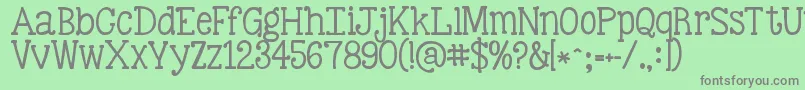 フォントKgbestillandknow – 緑の背景に灰色の文字