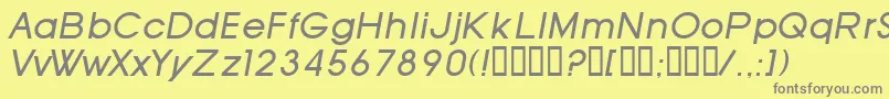 SfOldRepublicItalic-fontti – harmaat kirjasimet keltaisella taustalla