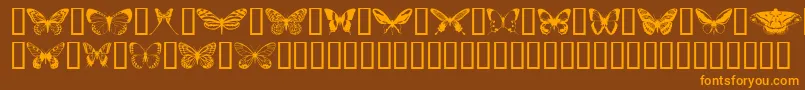 フォントButterflips – オレンジ色の文字が茶色の背景にあります。