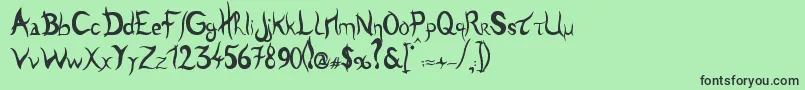 Tulen-Schriftart – Schwarze Schriften auf grünem Hintergrund