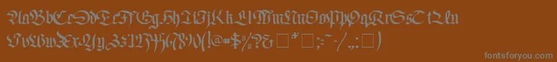 FaustusNormal-fontti – harmaat kirjasimet ruskealla taustalla