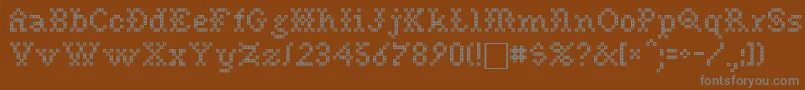 Шрифт NeedlePointSewPlain – серые шрифты на коричневом фоне