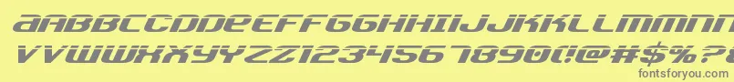 フォントTeamamericalaser – 黄色の背景に灰色の文字
