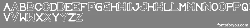 フォントSubmitToFaith – 灰色の背景に白い文字