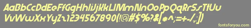 フォントAbraxeousextrathinitalic – 黄色のフォント、灰色の背景