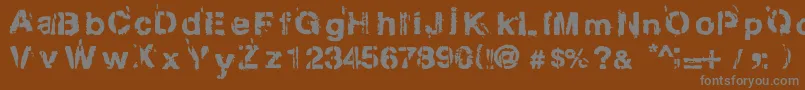 Gregphix-fontti – harmaat kirjasimet ruskealla taustalla