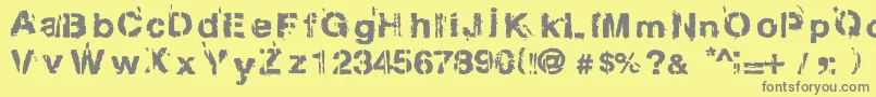 フォントGregphix – 黄色の背景に灰色の文字