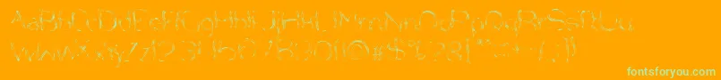 NiceDreamComeTrue-Schriftart – Grüne Schriften auf orangefarbenem Hintergrund