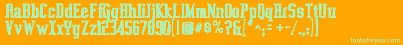 Czcionka Vahikaink – zielone czcionki na pomarańczowym tle