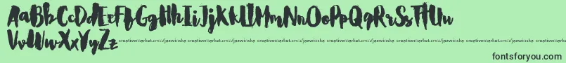 CarlitosDemo Font – Black Fonts on Green Background