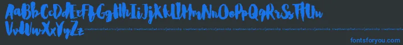 CarlitosDemo Font – Blue Fonts on Black Background