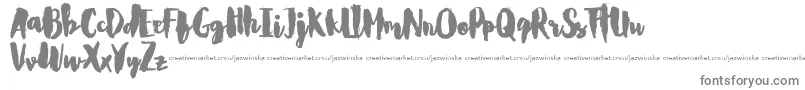 CarlitosDemo-fontti – harmaat kirjasimet valkoisella taustalla