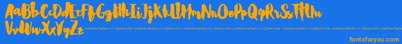 CarlitosDemo Font – Orange Fonts on Blue Background